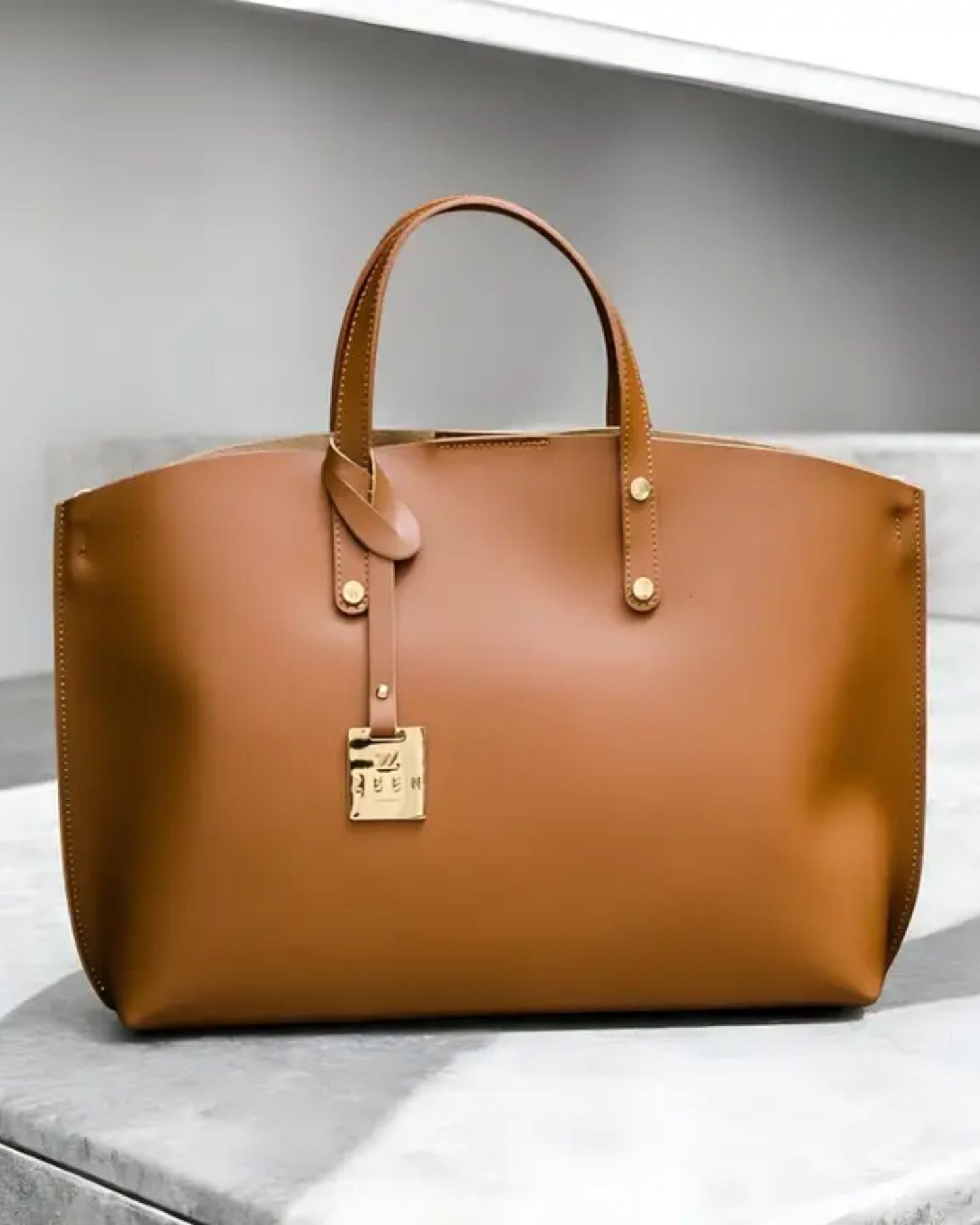 Handtasche in beige.