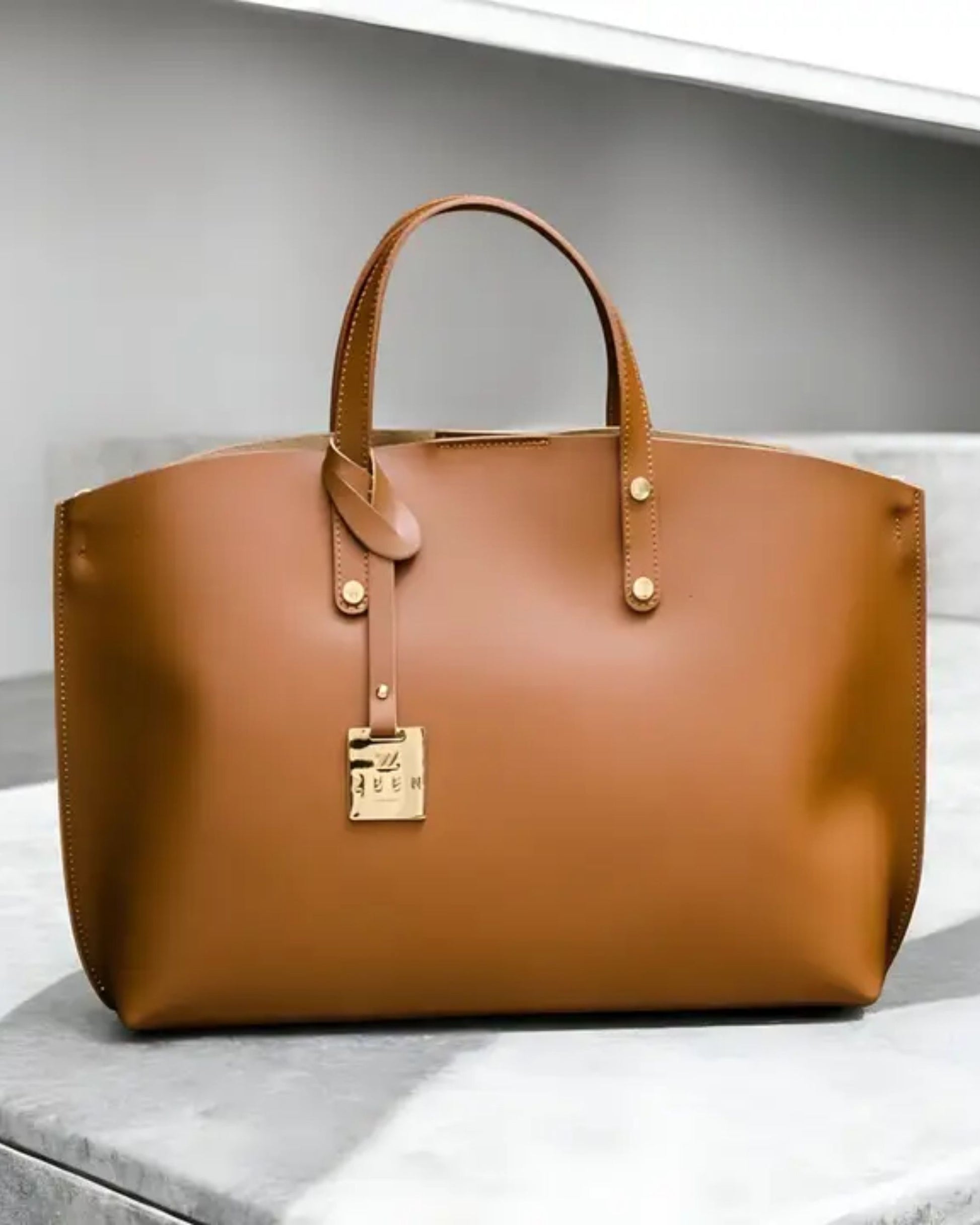 Handtasche in beige.