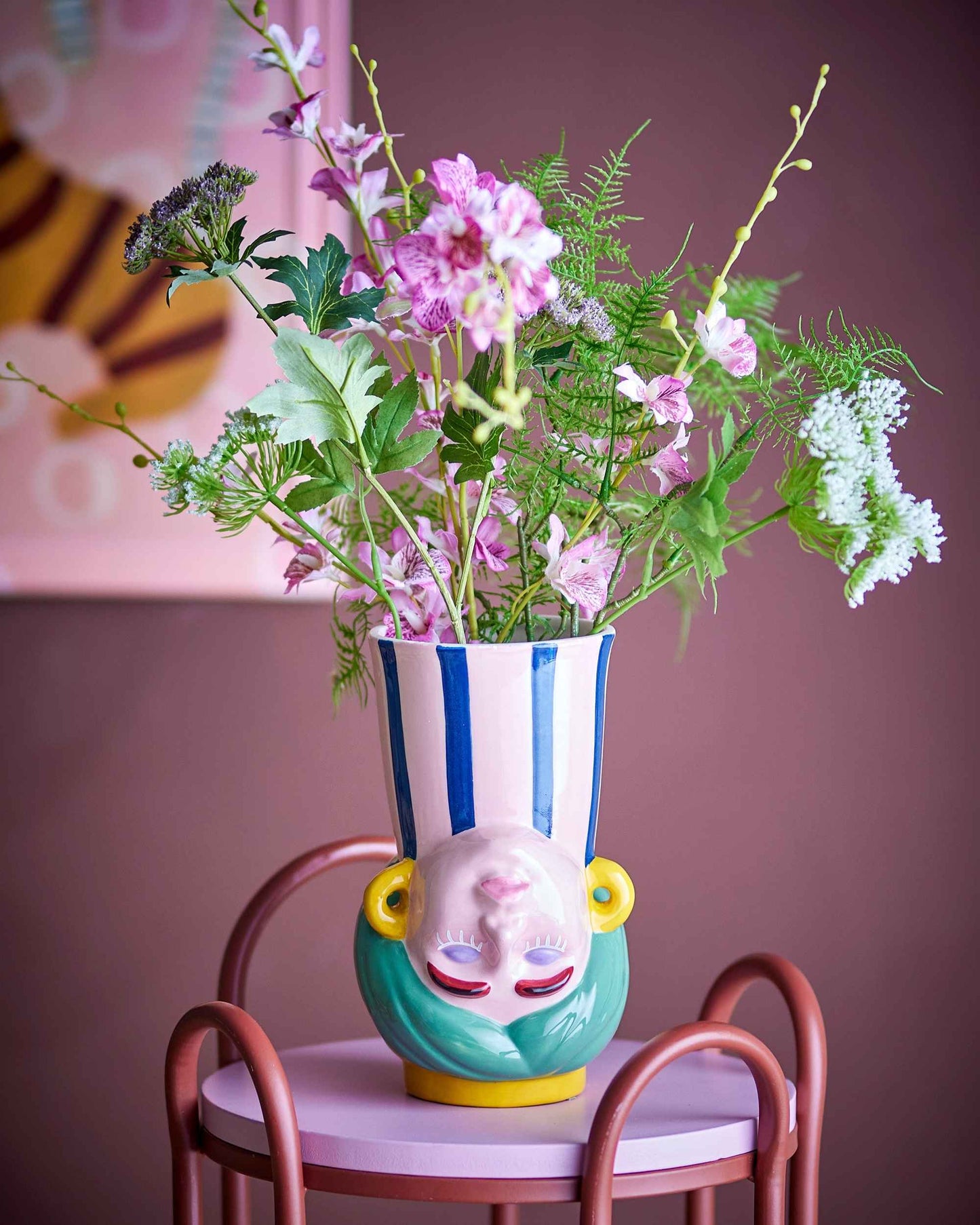 Vase oder Kerzenständer mit Gesicht. Steht das Gesicht auf dem Kopf hast Du eine Vase. Steht das Gesicht nicht auf dem Kopf hast Du einen Kerzenständer.