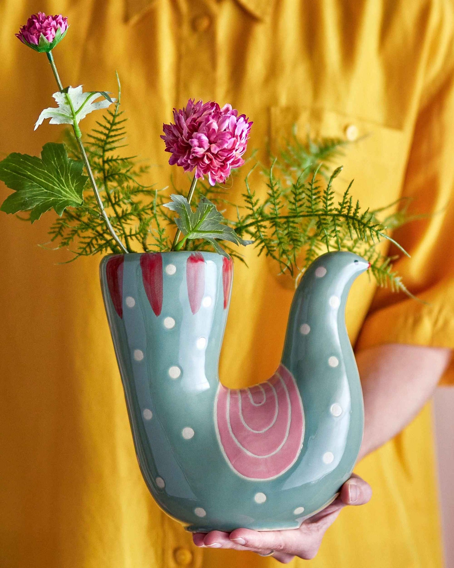 Blumenvase in Form eines Vogels.